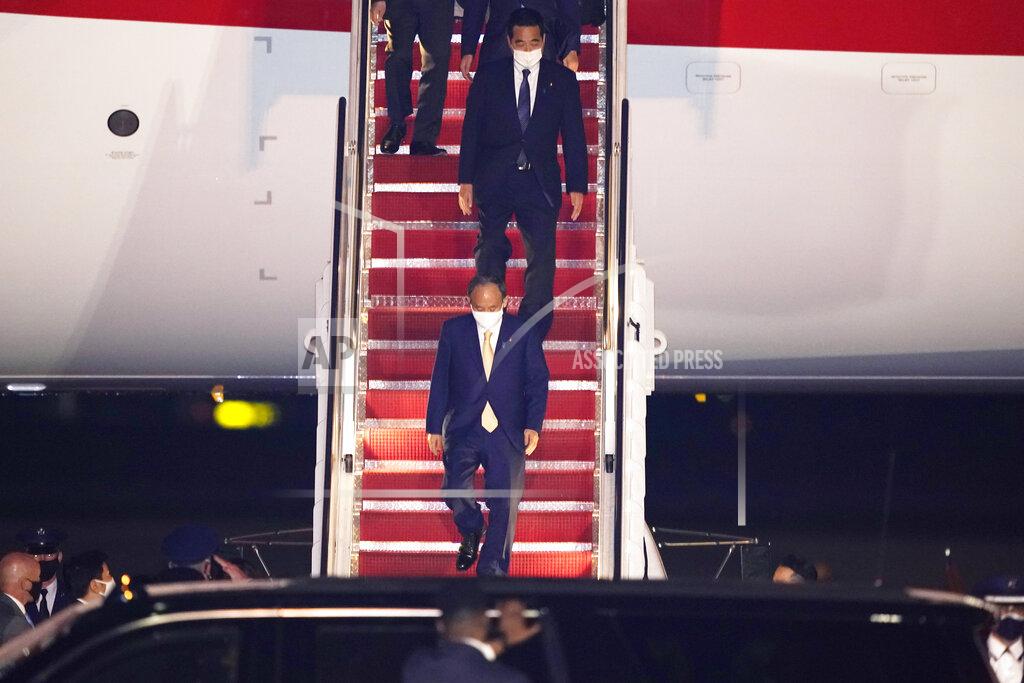 Manuel Balce Ceneta Japanese Prime Minister Yoshihide Suga arrives at Andrews Air Force Base, Md., Thursday, April 15, 2021. Suga will be the first foreign leader to have a face-to-face meeting with President Joe Biden, when they meet at the White House on Friday. (AP Photo/Manuel Balce Ceneta)