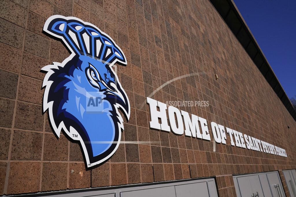 Seth Wenig An image of a peacock adorns the recreation center at Saint Peter's University in Jersey City, N.J., Monday, March 21, 2022. (AP Photo/Seth Wenig)