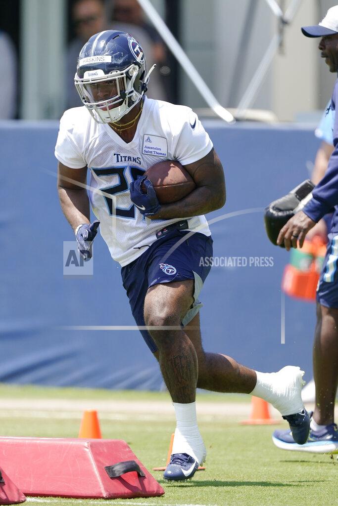 Mark Humphrey Tennessee Titans running back Hassan Haskins takes part in drills at the NFL football team's rookie minicamp Friday, May 13, 2022, in Nashville, Tenn. (AP Photo/Mark Humphrey)