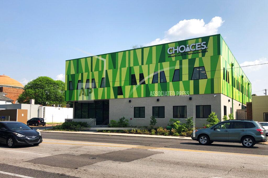 Adrian Sainz Cars drive past CHOICES: Memphis Center for Reproductive Health on Thursday, May 12, 2022, in Memphis, Tenn. The clinic is opening a new one in Carbondale, Ill., later this year. (AP Photo/Adrian Sainz)