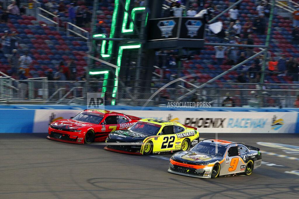 Ralph Freso Justin Allgaier (7), Austin Cindric (22) and Noah Gragson (9) race side by side for the lead through Turn 4 on the final lap of the NASCAR Xfinity Series auto race at Phoenix Raceway, Saturday, Nov. 7, 2020, in Avondale, Ariz. (AP Photo/Ralph Freso)