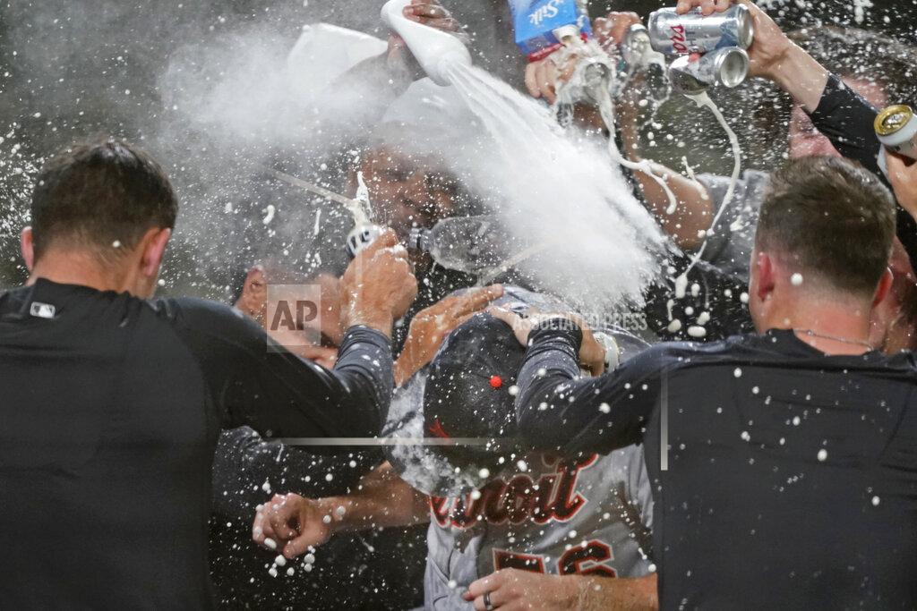 Ted S. Warren Detroit Tigers starting pitcher Spencer Turnbull (56) is showered with beer and powder by teammates after Turnbull threw a no-hitter in the team's baseball game against the Seattle Mariners, Tuesday, May 18, 2021, in Seattle. The Tigers won 5-0. (AP Photo/Ted S. Warren)