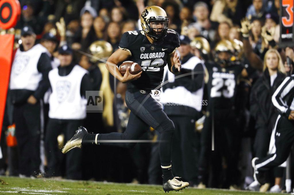 FILE - In this Sept. 28, 2018, file photo, Colorado quarterback Steven Montez runs for a touchdown against UCLA during the second half of an NCAA college football game, in Boulder, Colo. The Buffaloes (4-0, 1-0) host Arizona State (3-2, 1-0) Saturday with the chance to prove their best start in 20 years isn't a product of an early-season schedule that turned softer than anyone imagined.(AP Photo/David Zalubowski, File)