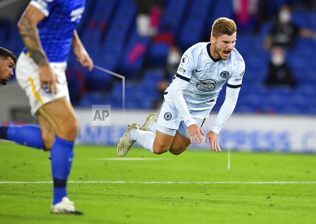 Glynn Kirk Chelsea's Timo Werner reacts after he is fouled by Brighton's goalkeeper Mathew Ryan during the English Premier League soccer match between Brighton and Chelsea at Falmer Stadium in Brighton, England, Monday, Sept. 14, 2020. (Glynn Kirk/Pool via AP)
