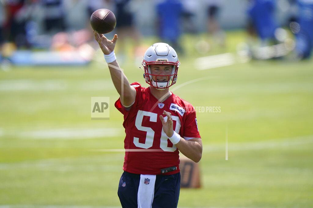 Steven Senne New England Patriots quarterback Mac Jones passes the ball during NFL football practice in Foxborough, Mass., Thursday, May 27, 2021. (AP Photo/Steven Senne)