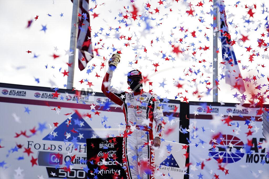 Brynn Anderson Ryan Blaney celebrates his win after a NASCAR Cup Series auto race at Atlanta Motor Speedway on Sunday, March 21, 2021, in Hampton, Ga. (AP Photo/Brynn Anderson)