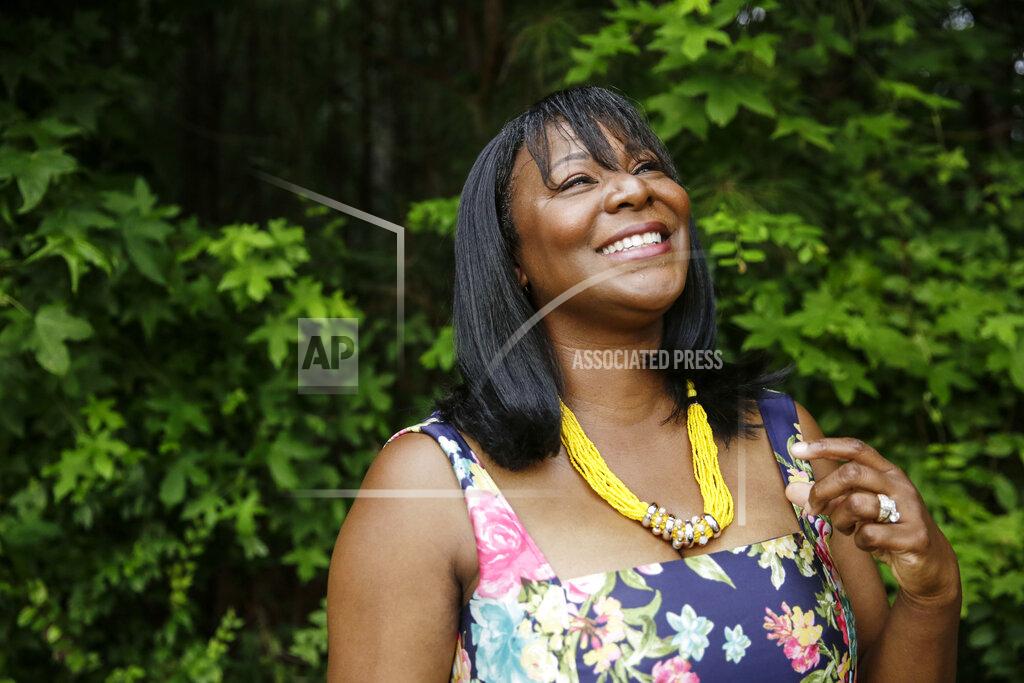 Brynn Anderson Chinita Allen poses for a portrait on Friday, July 24, 2020, in Marietta, Ga. "It's all about knowing your worth," she said of her political evolution. "We've always been here, like the Underground Railroad. But it's surfaced now. In a big way. It's a rail train," said Allen. (AP Photo/Brynn Anderson)