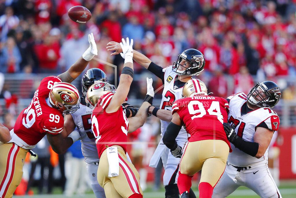 John Hefti Atlanta Falcons quarterback Matt Ryan (2) passes as San Francisco 49ers defensive tackle DeForest Buckner (99), defensive end Nick Bosa (97) and defensive end Solomon Thomas (94) apply pressure during the first half of an NFL football game in Santa Clara, Calif., Sunday, Dec. 15, 2019. (AP Photo/John Hefti)