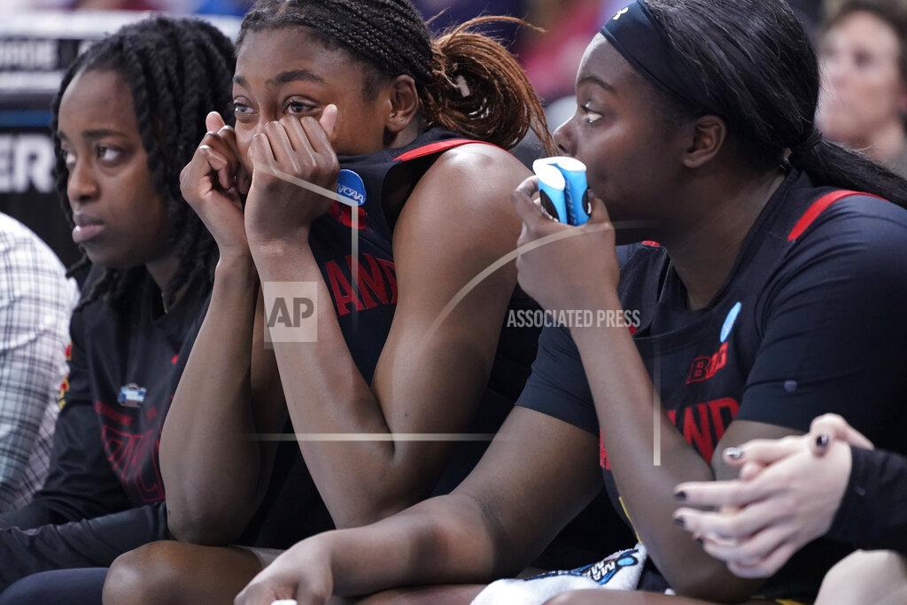 Ted S. Warren Maryland players, including guard Diamond Miller, center, sit on the bench late in the second half of a college basketball game against Stanford in the Sweet 16 round of the NCAA tournament, Friday, March 25, 2022, in Spokane, Wash. Stanford won 72-66. (AP Photo/Ted S. Warren)
