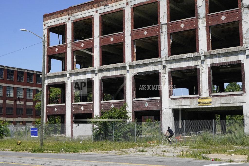 Carlos Osorio Exterior of the Packard Plant on Detroit's east side, Thursday, June 30, 2022. The factory built in the early 1900s turned out high-end cars into the 1950s. It was considered one of the city's automotive jewels, but now is among the nation's most notorious examples of urban blight. Parts of the 3.5 million-square-foot, 40-acre Packard plant complex will be demolished by the year's end. (AP Photo/Carlos Osorio)