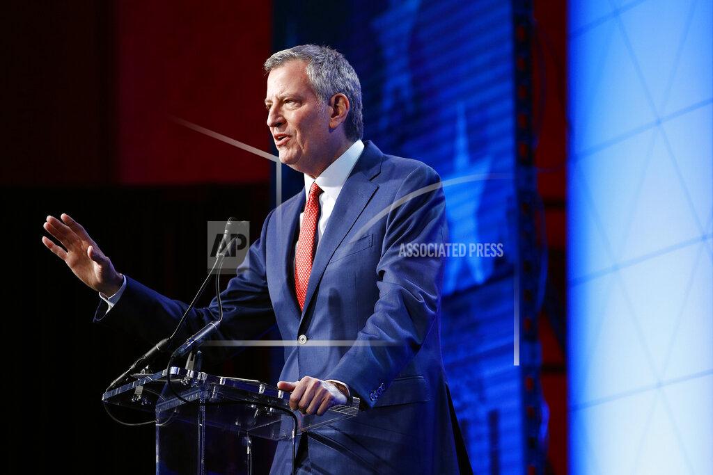 New York City Mayor Bill de Blasio speaks at the ​U.S. Conference of Mayors' Winter Meeting, Wednesday, Jan. 22, 2020, in Washington. (AP Photo/Patrick Semansky)