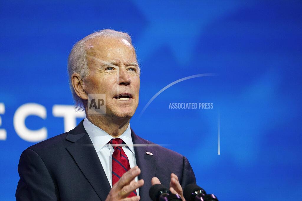 Susan Walsh President-elect Joe Biden speaks during an event at The Queen theater in Wilmington, Del., Tuesday, Dec. 8, 2020, to announce his health care team. (AP Photo/Susan Walsh)
