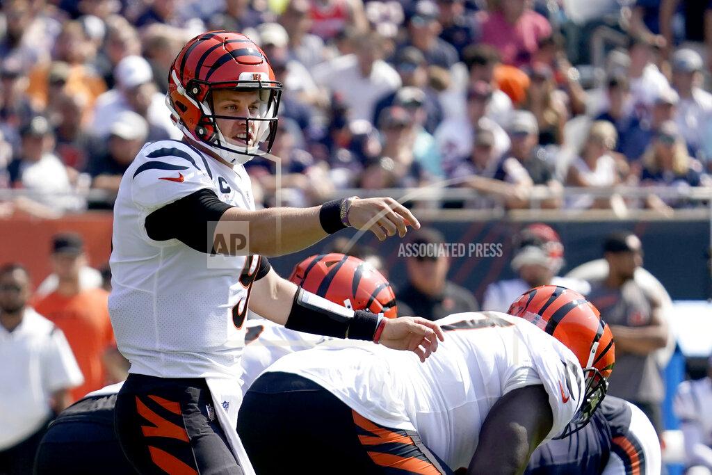 Nam Y. Huh Cincinnati Bengals quarterback Joe Burrow calls a play at the line of scrimmage during the first half of an NFL football game against the Chicago Bears Sunday, Sept. 19, 2021, in Chicago. (AP Photo/Nam Y. Huh)