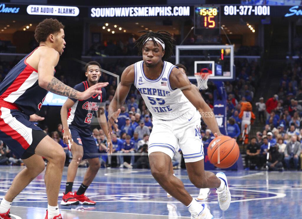 Karen Pulfer Focht Memphis' Precious Achiuwa (55) drives the ball around Mississippi's KJ Buffen (5) in the second half of an NCAA college basketball game Saturday, Nov. 23, 2019, in Memphis, Tenn. (AP Photo/Karen Pulfer Focht)