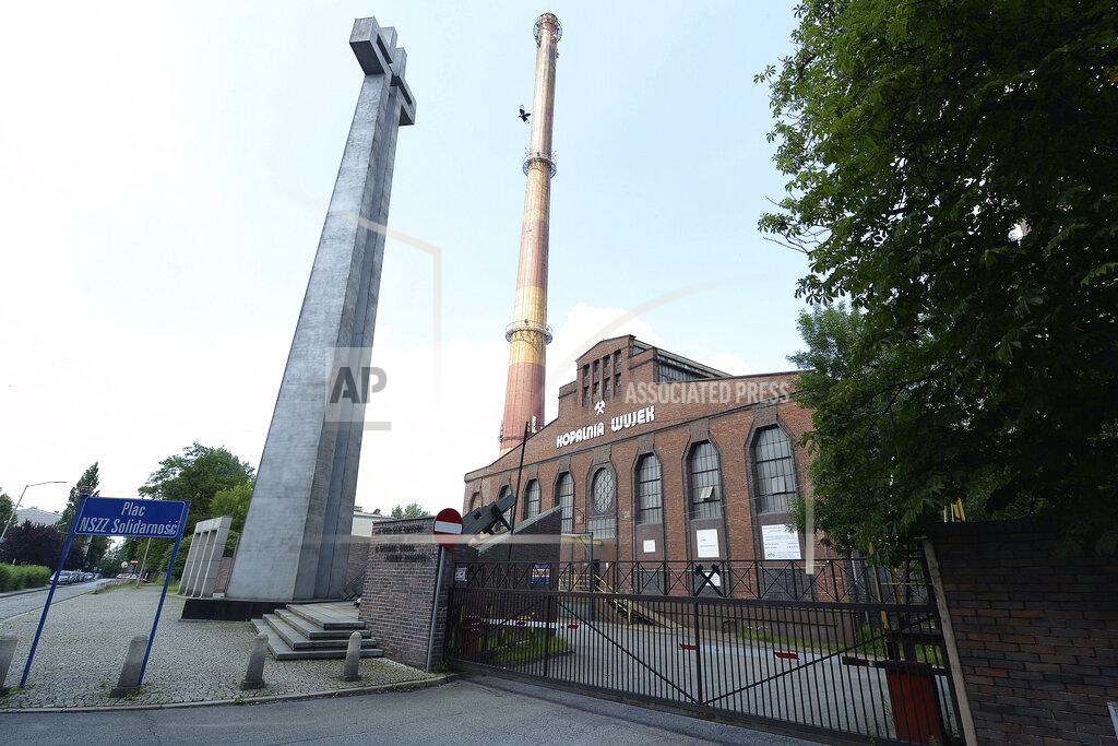 Czarek Sokolowski This Saturday, July 4, 2020, photo shows the Wujek coal mine in Katowice, Poland. The coronavirus has ripped through Poland's coal industry in the southern Silesia region, forcing many to stay home from work and triggering a three-week closure of many state-run mines. (AP Photo/Czarek Sokolowski)