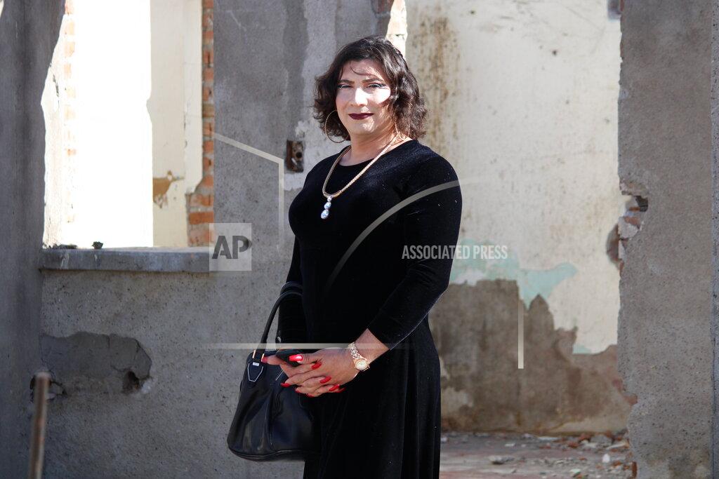Uncredited This photo provided by the International Rescue Committee shows Susana Coreas, a transwoman who fled El Salvador, is seen in Ciudad Juarez, Mexico, on March 24, 2021. Coreas was allowed into the United States in May after she was determined to be particularly vulnerable waiting in Mexico and given an exemption to federal pandemic-related powers that have prevented many from seeking asylum. A new effort by the Biden administration that is under pressure to lift the order is ramping up exemptions to the policy. (International Rescue Committee via AP)