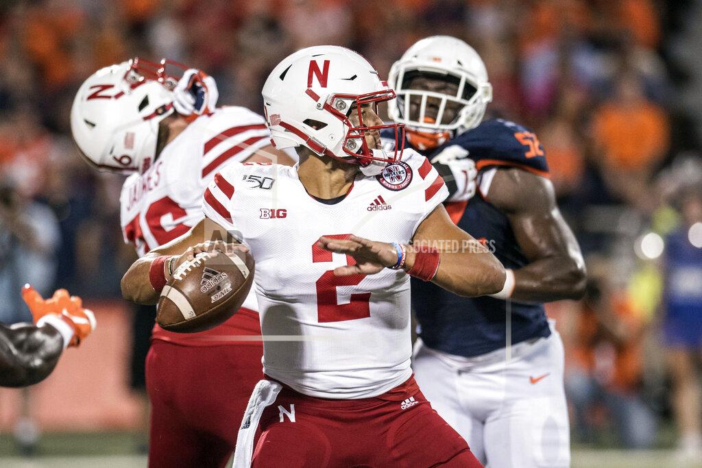 Holly Hart Nebraska quarterback Adrian Martinez (2) passes in the first half of an NCAA college football game against Illinois, Saturday, Sept. 21, 2019, in Champaign, Ill. (AP Photo/Holly Hart)