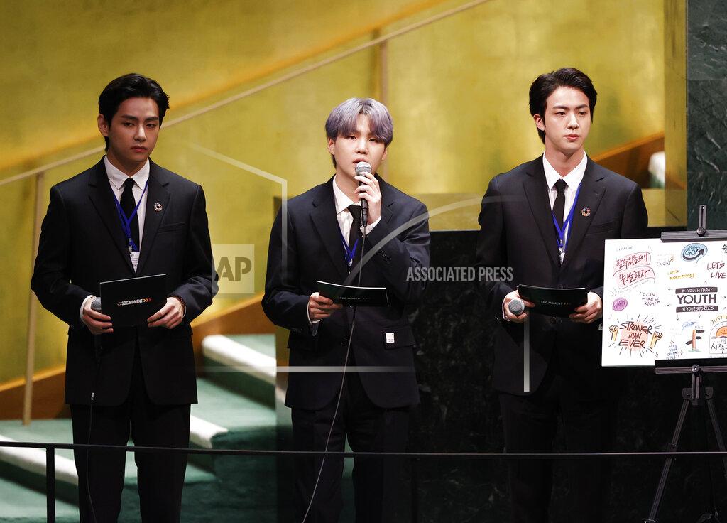 John Angelillo ADDS IDS - Members of South Korean K-pop band BTS, from left, V, Suga and Jin appear at the Sustainable Development Goals meeting during the 76th session of the United Nations General Assembly, at the United Nations Headquarters on Monday, Sept. 20, 2021. (John Angelillo/Pool via AP)