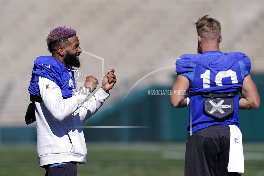 Mark J. Terrill Los Angeles Rams wide receiver Odell Beckham Jr., left, and wide receiver Cooper Kupp chat during practice for an NFL Super Bowl football game Thursday, Feb. 10, 2022, in Pasadena, Calif. The Rams are scheduled to play the Cincinnati Bengals in the Super Bowl on Sunday. (AP Photo/Mark J. Terrill)