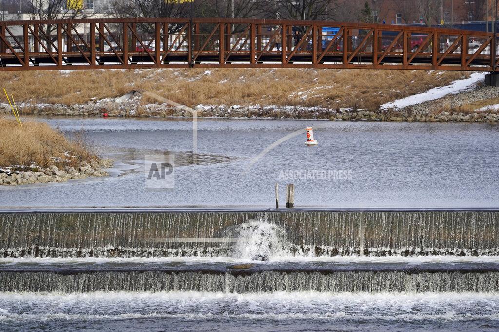 Paul Sancya A section of the Flint River is shown in Flint, Mich., Wednesday, Jan. 13, 2021. Some Flint residents impacted by months of lead-tainted water are looking past expected charges against former Gov. Rick Snyder and others in his administration to healing physical and emotional damages left by the crisis. (AP Photo/Paul Sancya)