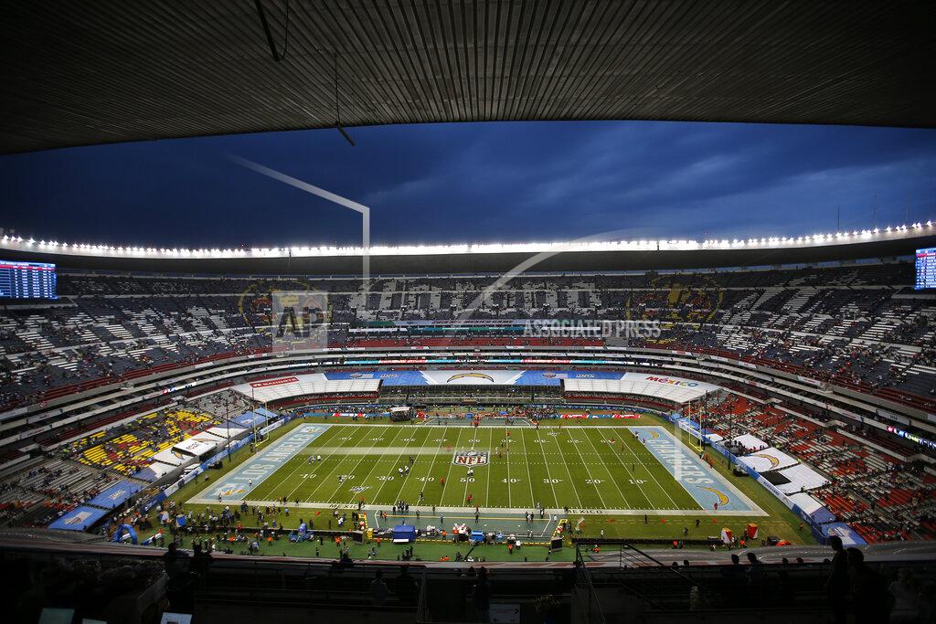 Eduardo Verdugo Players for the Los Angeles Chargers and the Kansas City Chiefs warm up before an NFL football game Monday, Nov. 18, 2019, in Mexico City. (AP Photo/Eduardo Verdugo)