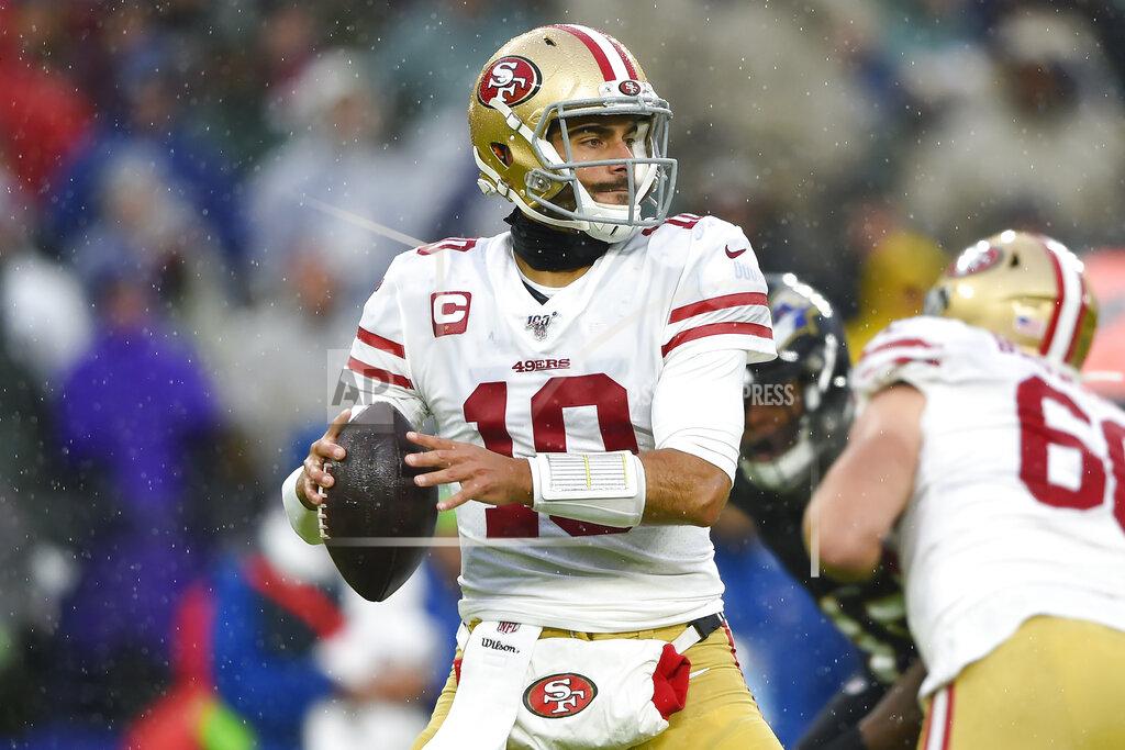 Gail Burton San Francisco 49ers quarterback Jimmy Garoppolo looks to pass the ball during the first half of an NFL football game against the Baltimore Ravens, Sunday, Dec. 1, 2019, in Baltimore, Md. (AP Photo/Gail Burton)