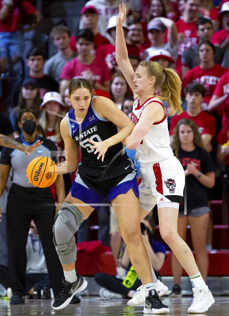 Ben Mckeown Kansas State's Ayoka Lee (50) works in the post against North Carolina State's Elissa Cunane, right, during the second half of a college basketball game in the second round of the NCAA tournament in Raleigh, N.C., Monday, March 21, 2022. (AP Photo/Ben McKeown)