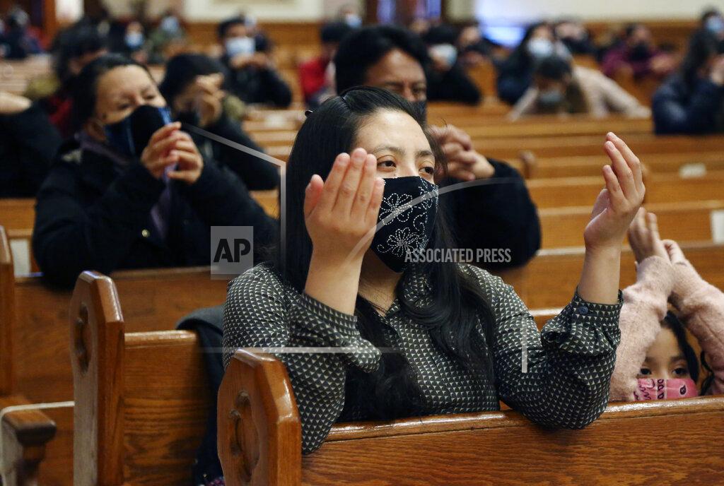 Jessie Wardarski Parishioners pray during Mass at Our Lady of Sorrows in the Queens borough of New York on Sunday, March 7, 2021. The Roman Catholic church reopened for in-person services in July 2020 and recently resumed in-person confessions. (AP Photo/Jessie Wardarski)