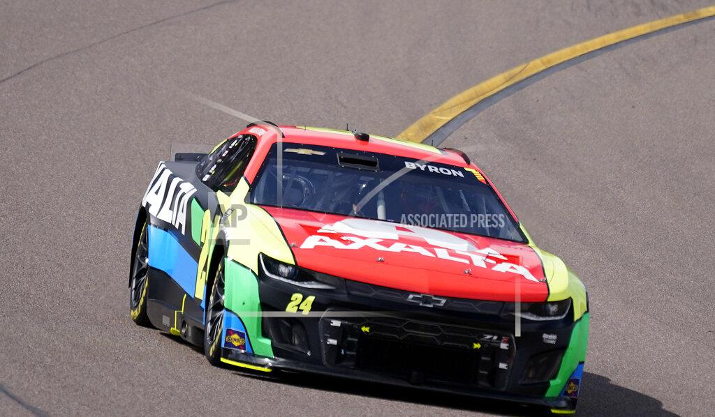 Darryl Webb William Byron (24) runs third early in a NASCAR Cup Series auto race at Phoenix Raceway, Sunday, March 13, 2022, in Avondale, Ariz. (AP Photo/Darryl Webb)