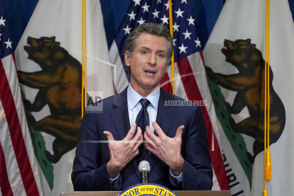 Rich Pedroncelli FILE - In this Jan. 8, 2021, file photo, California Gov. Gavin Newsom outlines his 2021-2022 state budget proposal during a news conference in Sacramento, Calif. About a year after the state's first coronavirus case, Newsom has gone from a governor widely hailed for his swift response to a leader facing criticism from all angles. (AP Photo/Rich Pedroncelli, Pool, File)