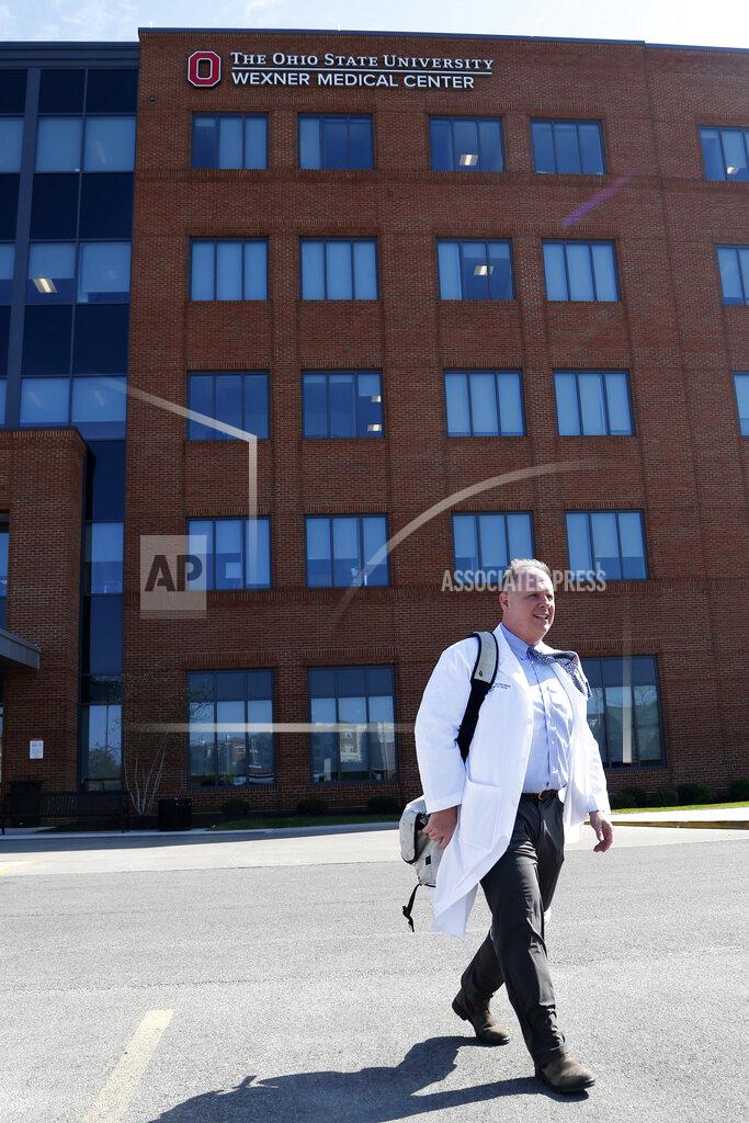 Jay Laprete Dr. Michael Cackovic, an OB/GYN who works at Ohio State University’s Wexner Medical Center, walks through the parking lot of the Ohio State Outpatient Care facility Friday, April 23, 2021, in Upper Arlington, Ohio. When Republican lawmakers across the U.S. kept passing bans on abortion at what they term “the first detectable fetal heartbeat,” he was exasperated. Yet bans pegged to the “fetal heartbeat” concept have been signed into law in 12 states, including Cackovic’s home state of Ohio, with another awaiting a governor’s signature. (AP Photo/Jay LaPrete)