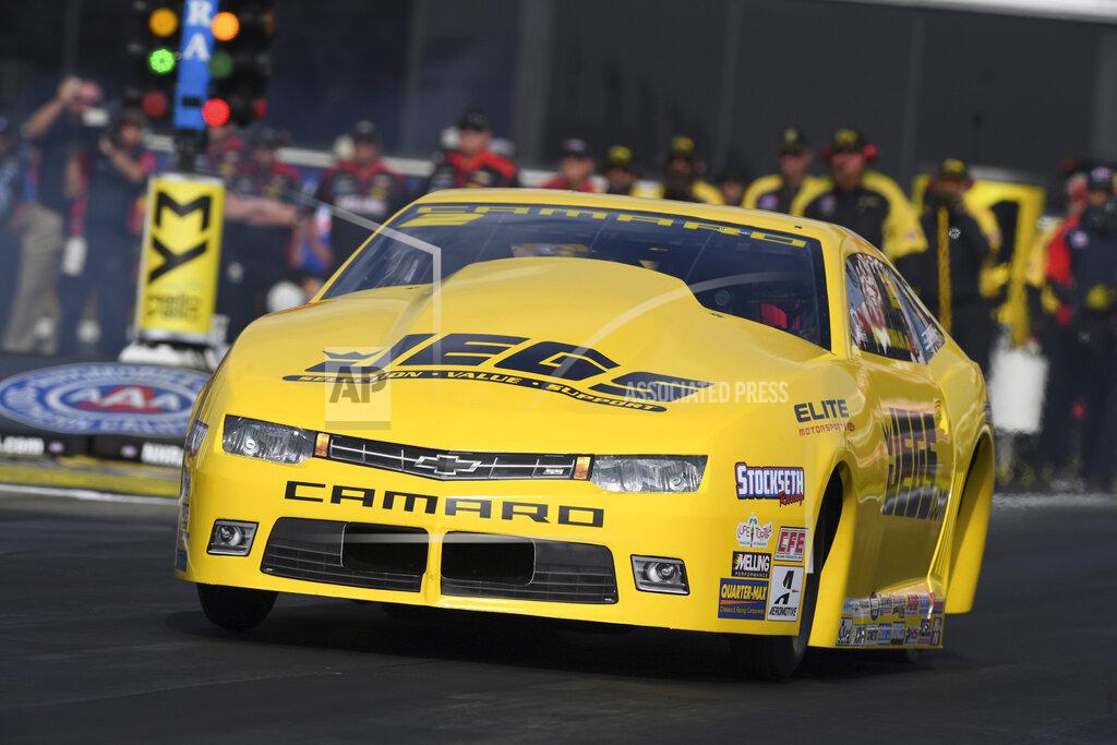 Jerry Foss In this photo provided by the NHRA, five-time Pro Stock world champion Jeg Coughlin drives to the provisional No. 1 spot at the annual Auto Club NHRA Finals in Pomona, Calif., Friday, Nov. 15, 2019. (Jerry Foss/NHRA via AP)