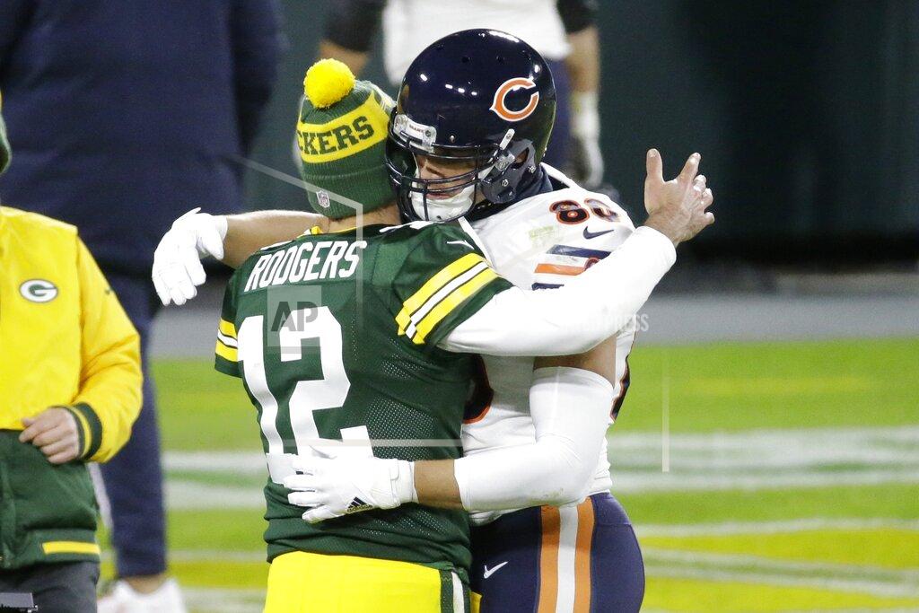 Mike Roemer Green Bay Packers' Aaron Rodgers hugs Chicago Bears' Jimmy Graham after an NFL football game against the Chicago Bears Sunday, Nov. 29, 2020, in Green Bay, Wis. The Packers won 41-25. (AP Photo/Mike Roemer)