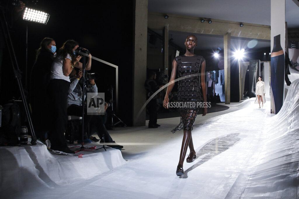 Vianney Le Caer A model wears a creation for the Hermes Spring-Summer 2021 fashion collection, Saturday, Oct. 3, 2020, during Paris fashion week. (Photo by Vianney Le Caer/Invision/AP)