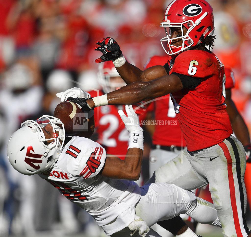 Mike Stewart Georgia running back James Cook (6) hits Austin Peay wide receiver DeAngelo Wilson (11) on a kick return during the second half of an NCAA college football game, Saturday, Sept. 1, 2018, in Athens, Ga. Cook was ejected from the game. Georgia won 45-0. (AP Photo/Mike Stewart)