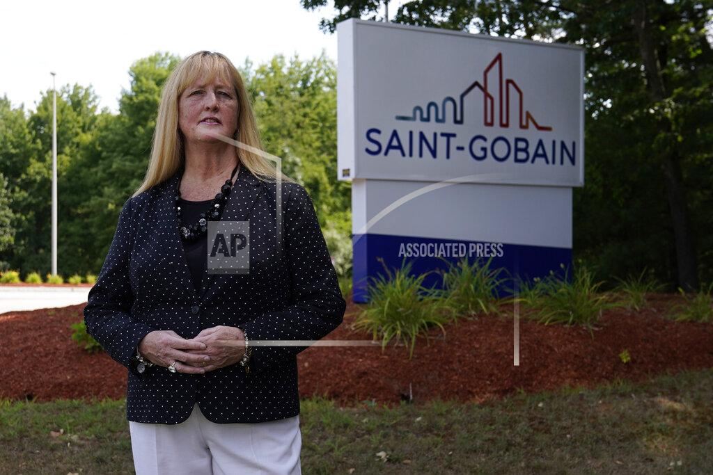 Charles Krupa In this Friday, Aug. 14, 2020, photo New Hampshire Rep. Nancy Murphy, D-Merrimack, poses for a photo outside the Saint-Gobain plastics factory in Merrimack, N.H. (AP Photo/Charles Krupa)
