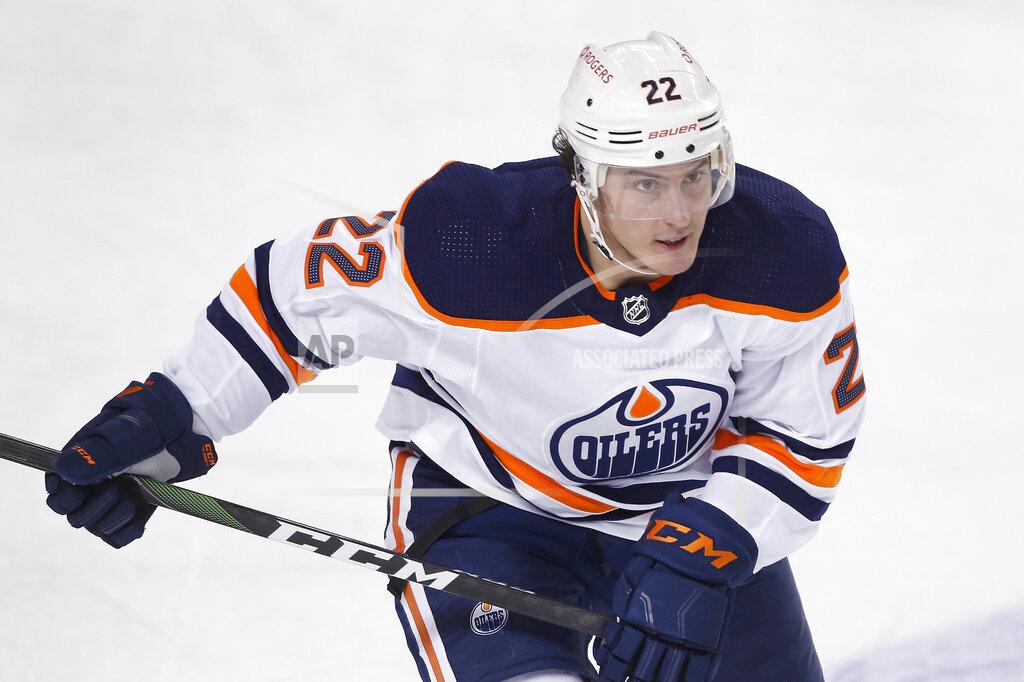 Larry Macdougal FILE - Edmonton Oilers player Tyson Barrie plays during an NHL hockey game against the Calgary Flames in Calgary, Alberta, in this Friday, Feb. 19, 2021, file photo. Edmonton has re-signed defenseman Tyson Barrie before he was eligible to become a free agent. (AP Photo/Larry MacDougal)