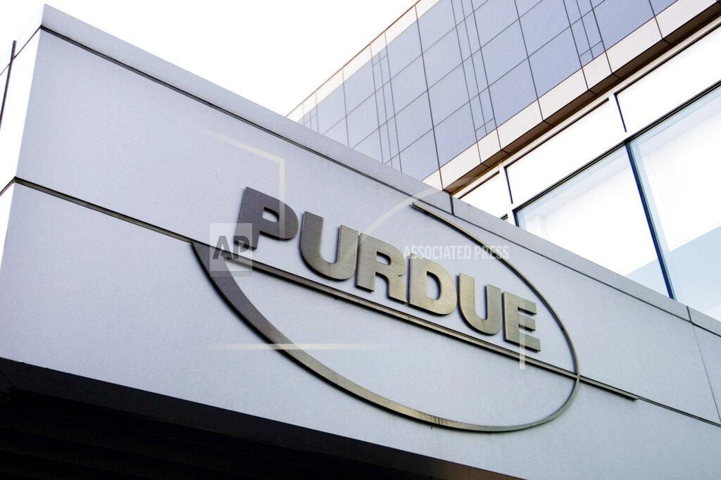 Douglas Healey FILE - This Tuesday, May 8, 2007, file photo shows the Purdue Pharma logo at its offices in Stamford, Conn. Purdue Pharma, the company that makes OxyContin, the powerful prescription painkiller that experts say helped touch off an opioid epidemic, will plead guilty to three federal criminal charges as part of a settlement of over $8 billion, Justice Department officials told The Associated Press. (AP Photo/Douglas Healey, File)