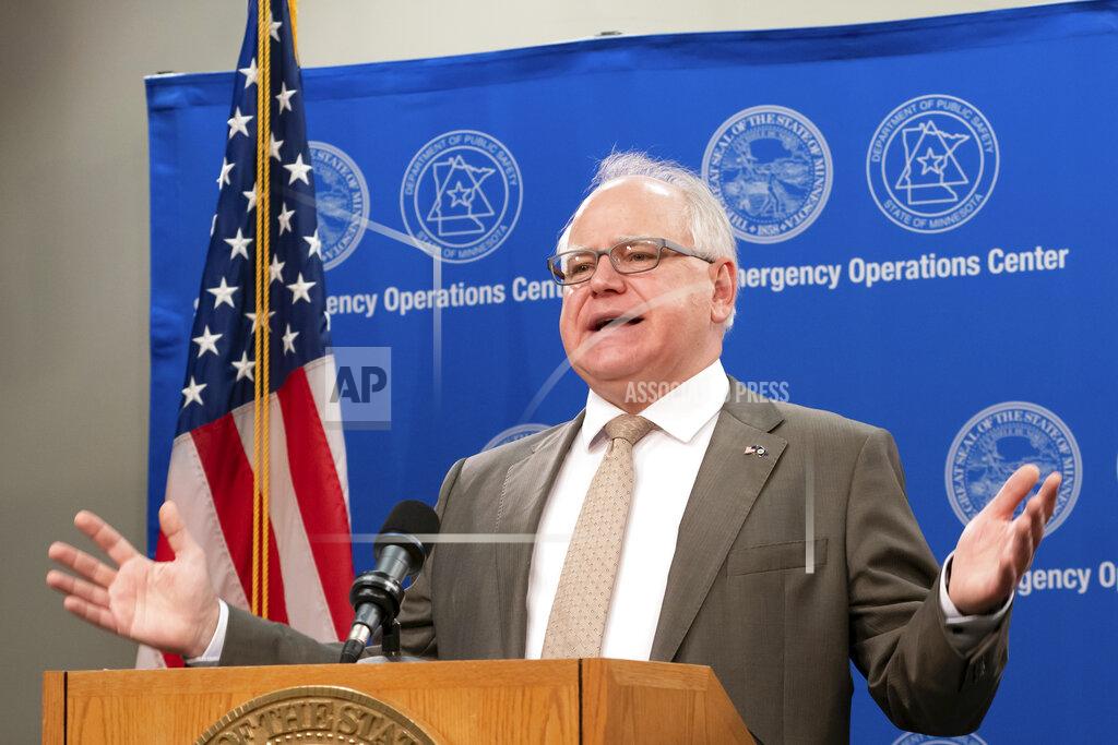 Glen Stubbe Minnesota Gov. Tim Walz announces new guidelines today for restaurants, bars, salons and barber shops during the coronavirus pandemic Wednesday, May 20, 2020. Restaurants and bars may reopen June 1 for outdoor dining with social distancing and other safeguards in place, while salons and barbershops will also be allowed to resume business at partial capacity. (Glen Stubbe/Star Tribune via AP, Pool)