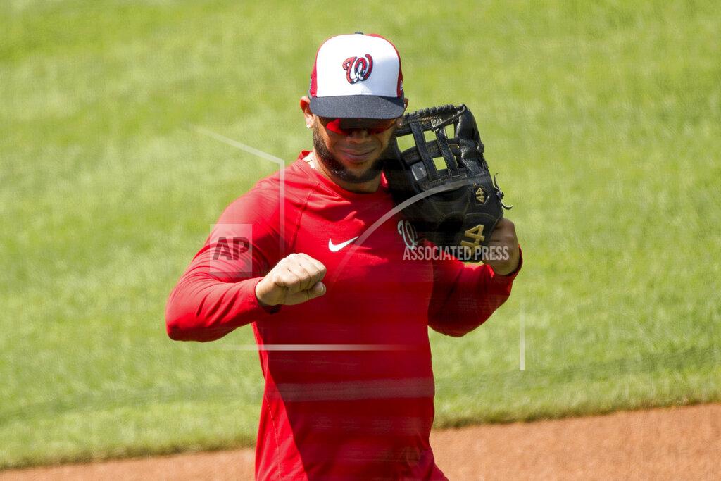 Andrew Harnik Washington Nationals' Anibal Sanchez holds up a fist to a staff member as the Washington Nationals hold their first training camp work out at Nationals Stadium, Friday, July 3, 2020, in Washington. (AP Photo/Andrew Harnik)