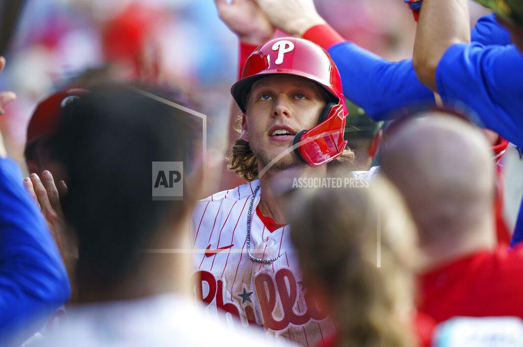 Chris Szagola Philadelphia Phillies' Alec Bohm celebrates his two-run home run with teammates during the third inning of a baseball game against the Los Angeles Dodgers, Saturday, May 21, 2022, in Philadelphia. (AP Photo/Chris Szagola)