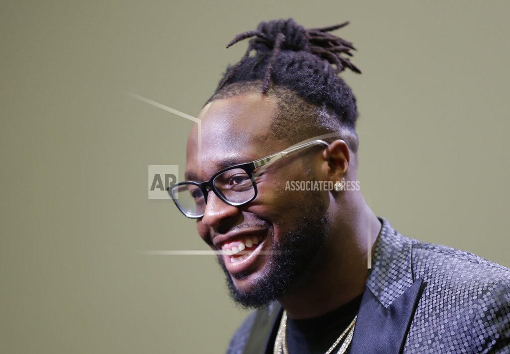 Chuck Burton Carolina Panthers Gerald McCoy answers a question during a news conference in Charlotte, N.C., Tuesday, June 4, 2019. After nine productive seasons with the Tampa Bay Buccaneers, the six-time Pro Bowl and three-time All-Pro NFL football defensive tackle McCoy signed with the Panthers. (AP Photo/Chuck Burton)