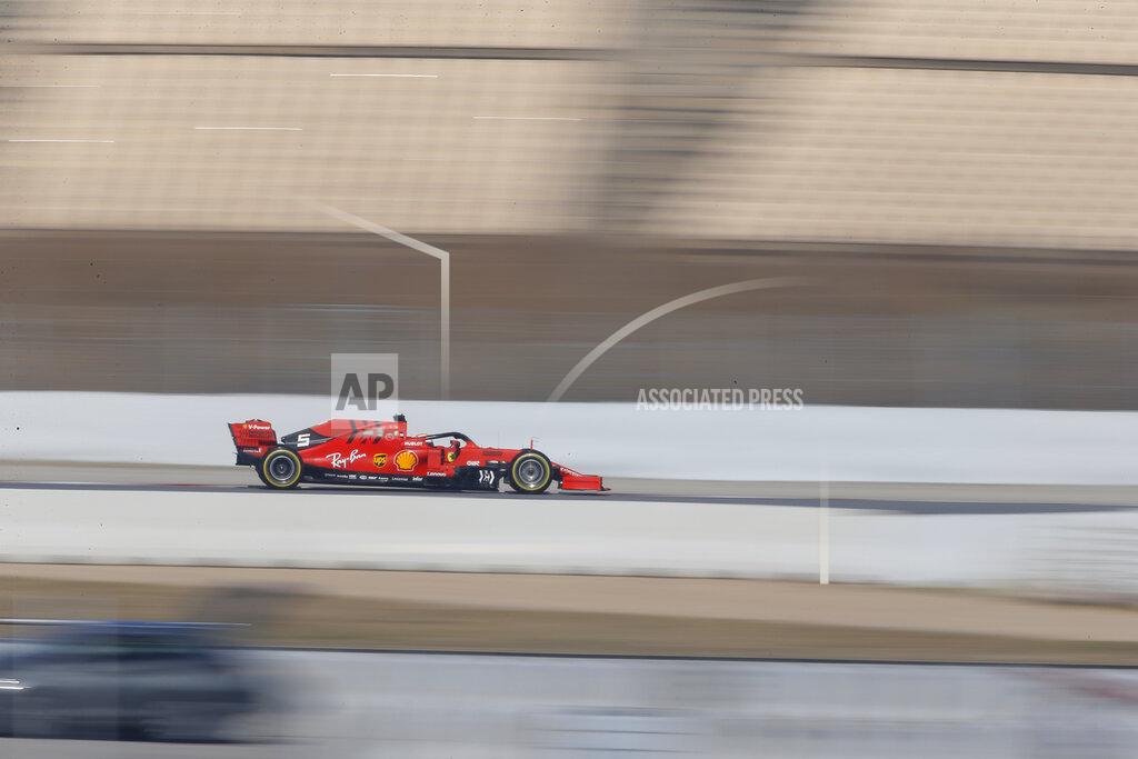Joan Monfort Ferrari driver Sebastian Vettel of Germany steers his car during a Formula One pre-season testing session at the Barcelona Catalunya racetrack in Montmelo, outside Barcelona, Spain, Wednesday, Feb. 27, 2019. (AP Photo/Joan Monfort)