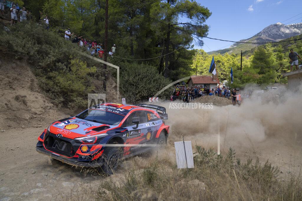 Petros Giannakouris Danis Sordo and his co driver Borha Rozada of Spain with their Hyundai i20 coupe WRC car compete in the WRC Acropolis Rally at the stage of Aghii Theodori, west of Athens, on Friday, Sept. 10, 2021. The World Rally Championship returned to Greece after an eight-year absence. (AP Photo/Petros Giannakouris)