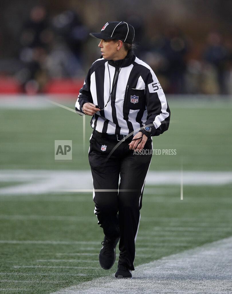 Charles Krupa Down judge Sarah Thomas works along the sideline during the second half of an NFL divisional playoff football game between the Los Angeles Chargers and the New England Patriots, Sunday, Jan. 13, 2019, in Foxborough, Mass. Thomas is the first woman to officiate an NFL playoff game. (AP Photo/Charles Krupa)