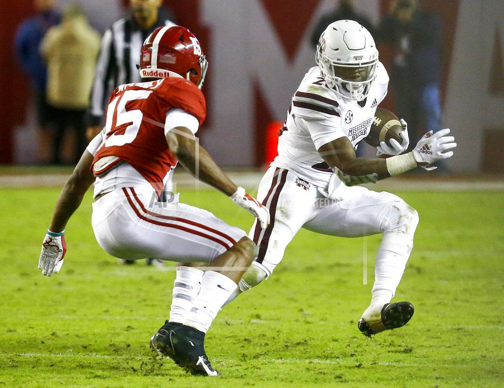 Butch Dill Mississippi State wide receiver Deddrick Thomas (2) tries to get around Alabama defensive back Xavier McKinney (15) as he carries the ball during the second half of an NCAA college football game, Saturday, Nov. 10, 2018, in Tuscaloosa, Ala. (AP Photo/Butch Dill)