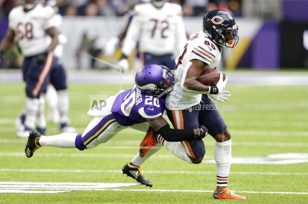 Andy Clayton-King Chicago Bears wide receiver Javon Wims, right, tries to break a tackle by Minnesota Vikings cornerback Mackensie Alexander, left, after catching a pass during the first half of an NFL football game, Sunday, Dec. 29, 2019, in Minneapolis. (AP Photo/Andy Clayton-King)