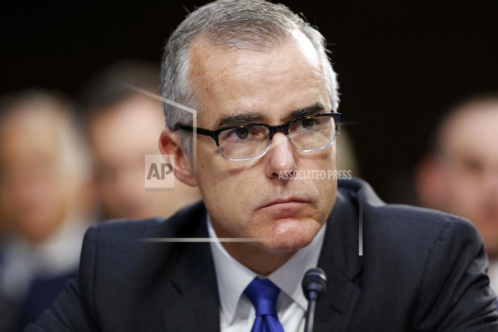 FILE - In this June 7, 2017, file photo, then FBI Acting Director Andrew McCabe listens during a Senate Intelligence Committee hearing on Capitol Hill in Washington. (AP Photo/Alex Brandon, File)