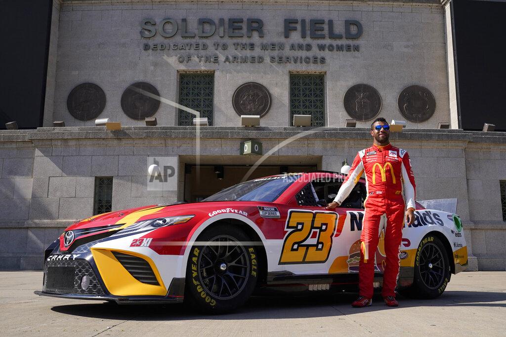 Charles Rex Arbogast NASCAR driver Bubba Wallace poses for photos outside Soldier Field on Tuesday, July 19, 2022, in Chicago during a promotional visit to announce a Cup Series street race in the city, to be held July 2, 2023. (AP Photo/Charles Rex Arbogast)