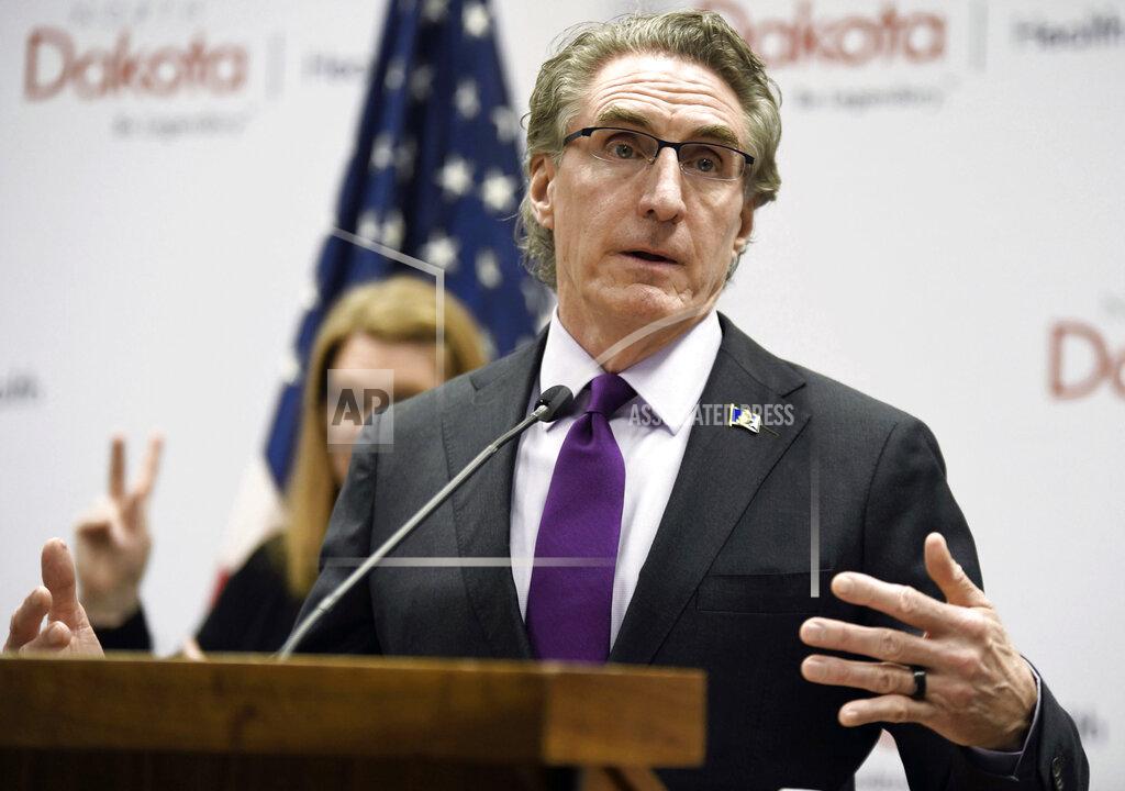 Mike Mccleary FILE - In this April 10, 2020, file photo, North Dakota Gov. Doug Burgum speaks at the state Capitol in Bismarck, N.D. Burgum will face Democratic gubernatorial candidate Shelley Lenz in the Nov. 3, general election. (Mike McCleary/The Bismarck Tribune via AP, File)